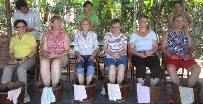 activity at pomelo gardens in hue cooking class tour